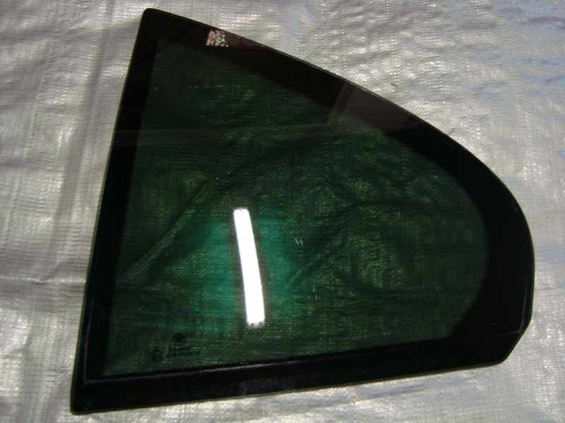 BMW E39 sedan SZYBA TYL TYLNA LEWA CZARNA ORYGINAL