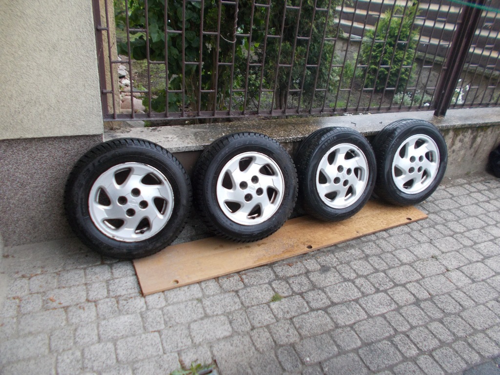 KOLA OPONY FELGI ALUMY NISSAN ALMERA 175X70X14 ŚRU