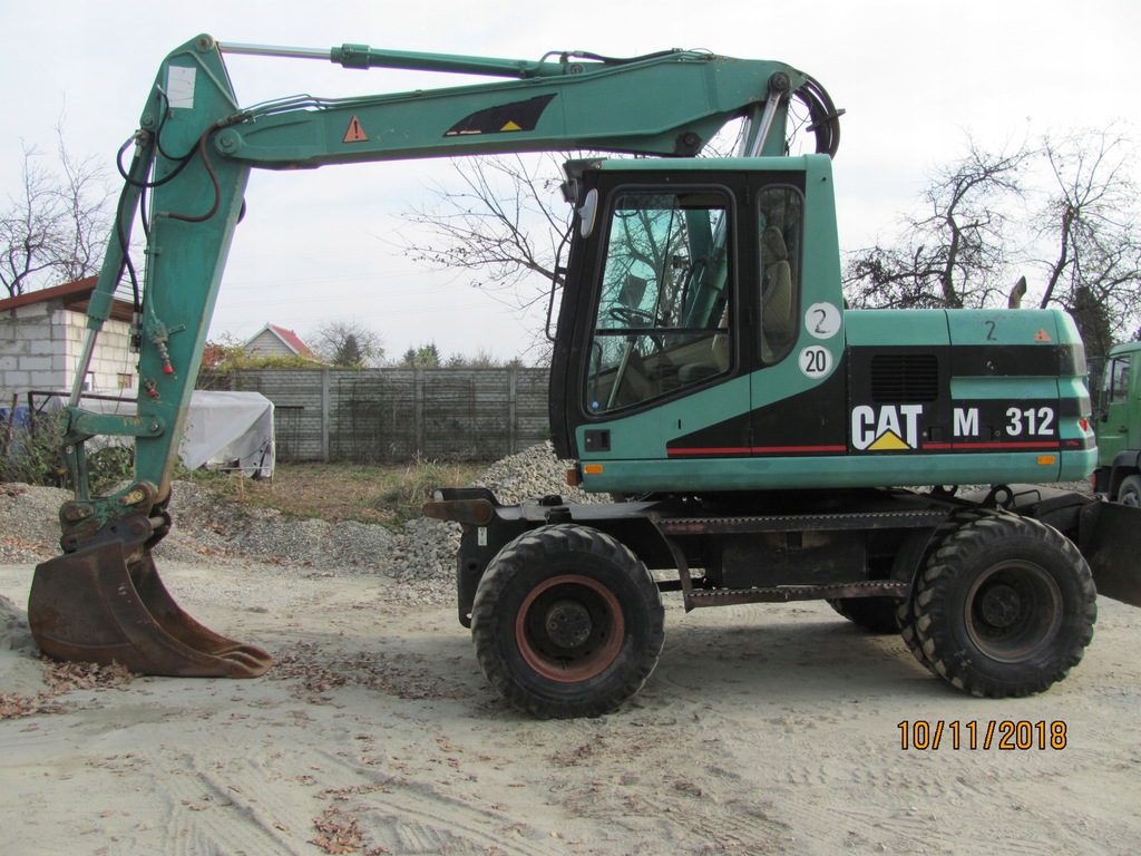 Koparka kołowa CAT M 312 rok.prod. 2000, 12329 mth