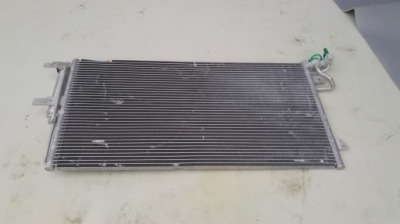 Ford оригінальний номер ej7h19710ac радіатор кондиціонера фото №1