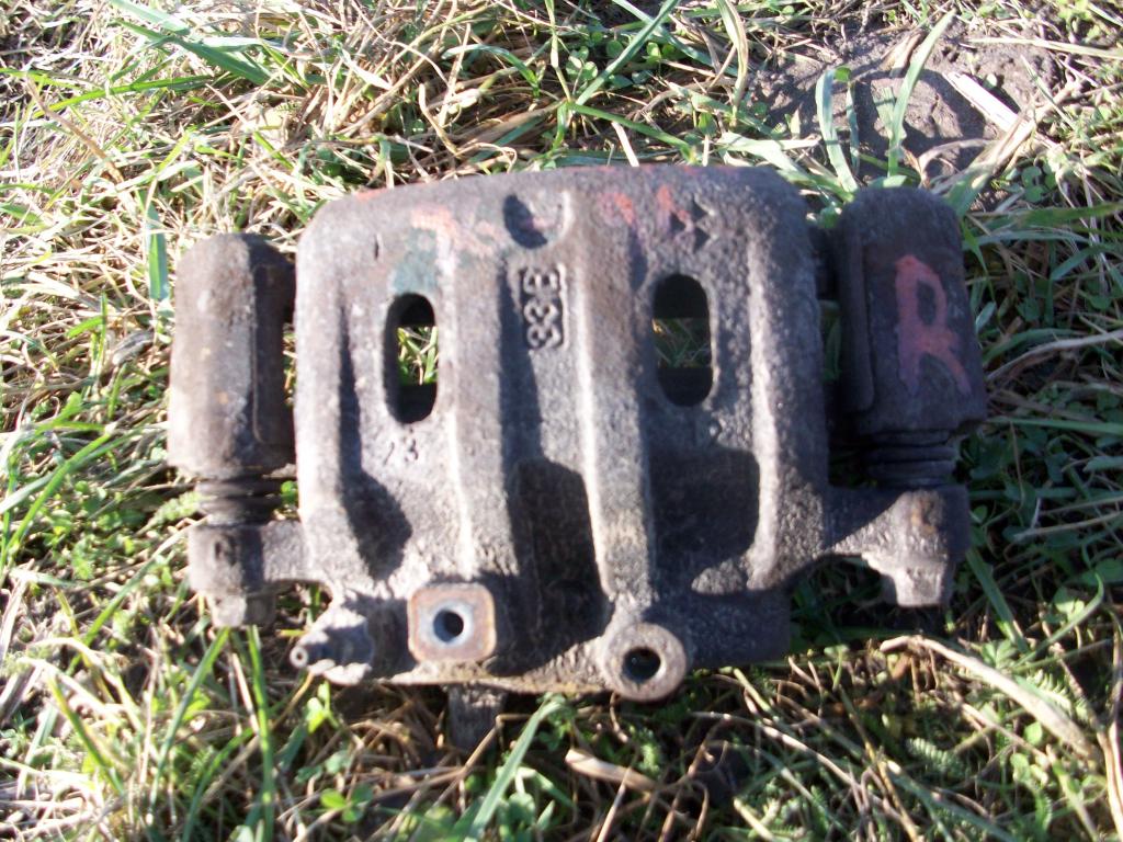 фото №1, L200 супорт гальмівний передній правий 1998-2005